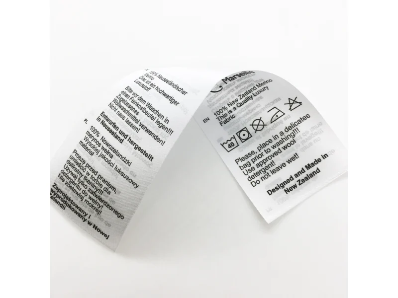 Parches bordados de Bilbao mostrado como ejemplo de fabricación de etiquetas textiles con etiqueta de tela impresa y etiqueta de cuidado